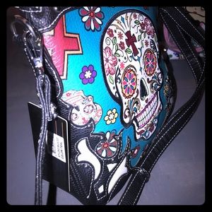 New skull w/concealed gun pocket bag